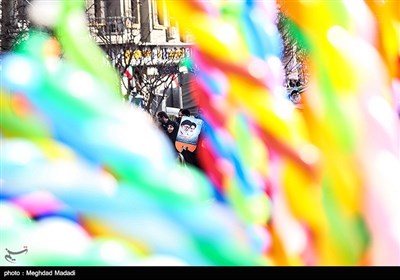 People in Iran's Capital Participate in Revolution Anniversary Rallies 