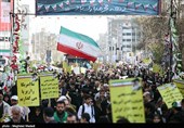 People in Iran's Capital Participate in Revolution Anniversary Rallies 