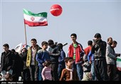 People in Iran's Capital Participate in Revolution Anniversary Rallies 