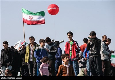 People in Iran's Capital Participate in Revolution Anniversary Rallies 