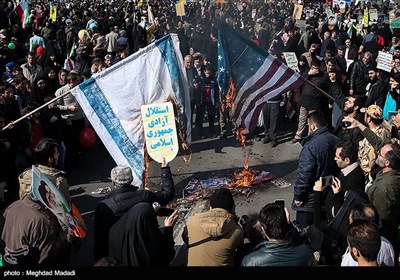 People in Iran's Capital Participate in Revolution Anniversary Rallies 