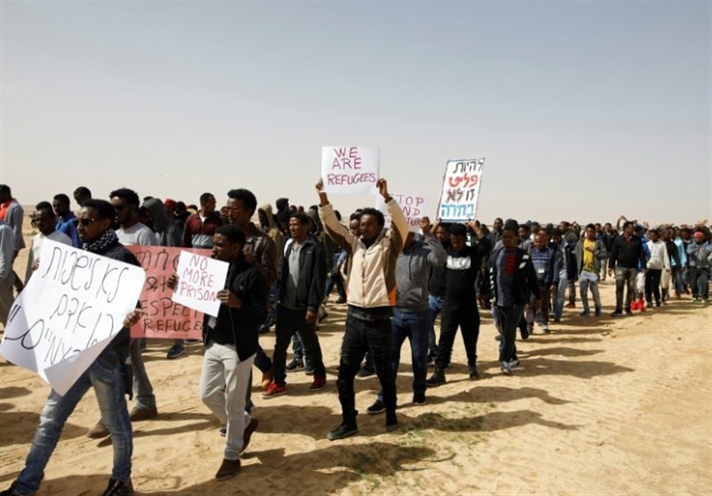 تظاهرات مهاجران آفریقایی در اعتراض به سیاست اخراج و حبس رژیم صهیونیستی+تصاویر