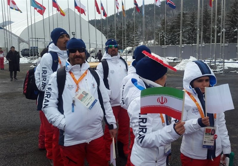 پارالمپیک زمستانی 2018| اهتزاز پرچم ایران در دهکده بازی‌ها + عکس