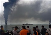 Oil Spill Fire Chokes Indonesian Port City; 4 Dead