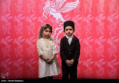 کودکان حاضر در پوستر سی‌وششمین جشنواره جهانی فیلم فجر