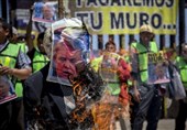 Migrants in Mexico Stage Colorful Anti-Trump Protest