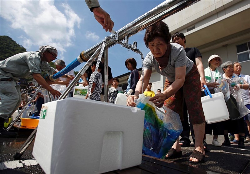 Japan Struggles to Restore Water to Flood-Hit Towns