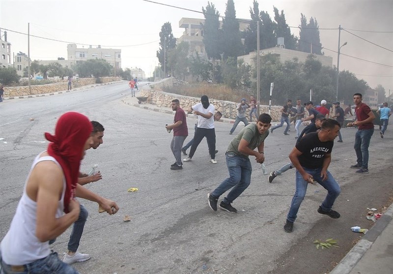Palestinian Protesters, Israeli Troops Clash In West Bank (+Video)