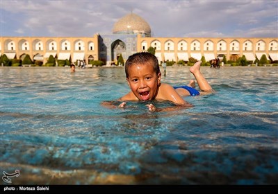 Children Playing with Water in Isfahan Naqsh-e Jahan Square