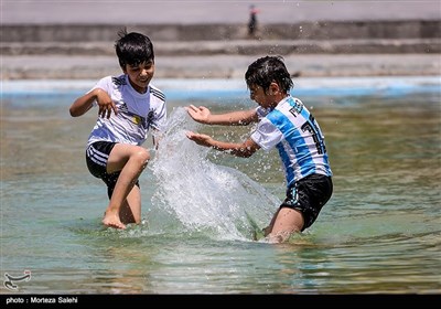 Children Playing with Water in Isfahan Naqsh-e Jahan Square 