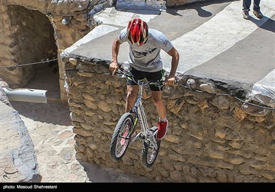 Iran’s Historical Village Hosts Mountain Bike Trials Competition