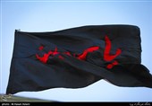 اهتزاز پرچم گنبد امام حسین(ع) بر فراز مراز شهدای گمنام