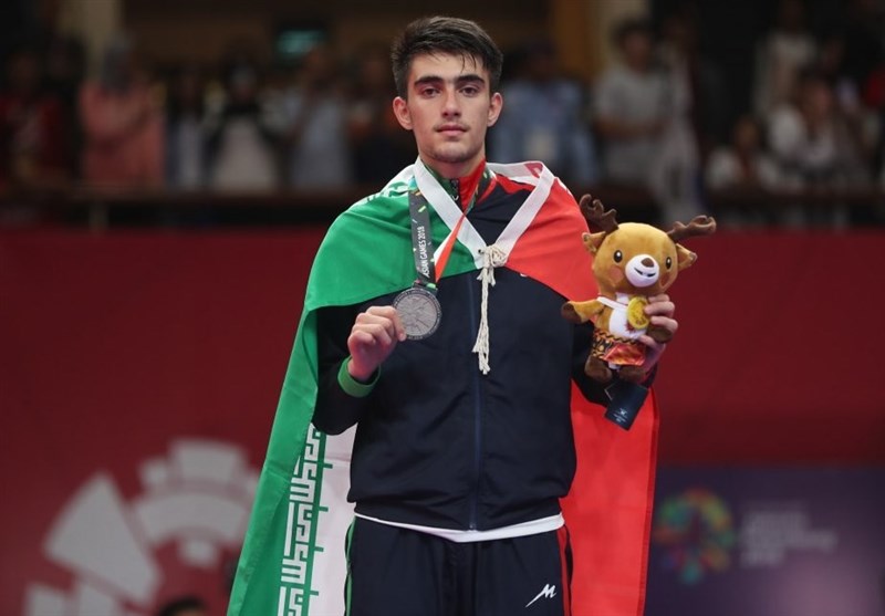 Iranian Taekwondo Athlete Bakhshi Seizes Silver: Asian Games