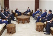 Iran FM Zarif Meets Syrian President Assad in Damascus
