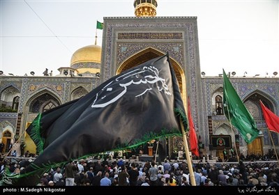 حرم مطہر امام رضاعلیہ السلام پر پرچم کشائی کی روح پرور تقریب کا انعقاد