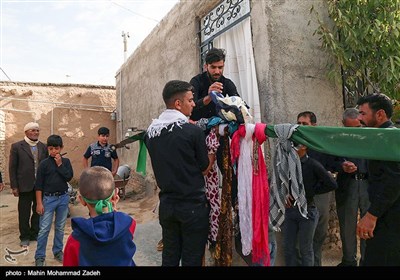 مراسم علم گردانی در روستای علی آباد قوچان