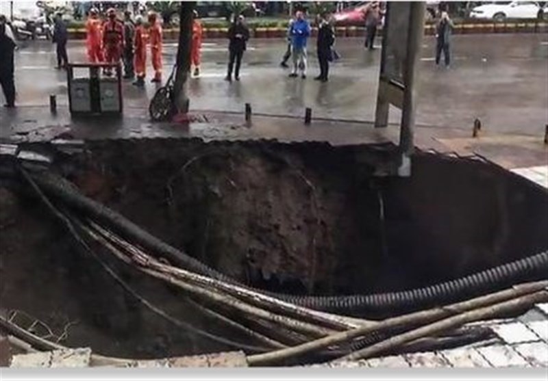 Footage Shows Horrifying Moment Four Pedestrians Being Swallowed by Sinkhole in China (+Video)