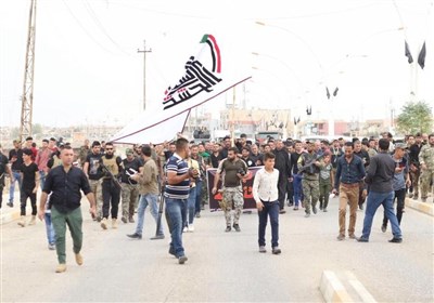 بالصور.. زوار الأربعین ینطلقون من الموصل لأول مرة بعد داعش