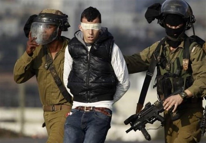 العدو الصهیونی یعتقل 14 فلسطینیا من الضفة الغربیة