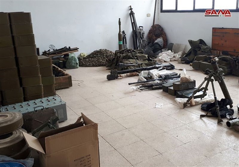 کشف انبارهای سلاح و داروی بر جا مانده از تروریست‌ها در حومه درعا+ تصاویر