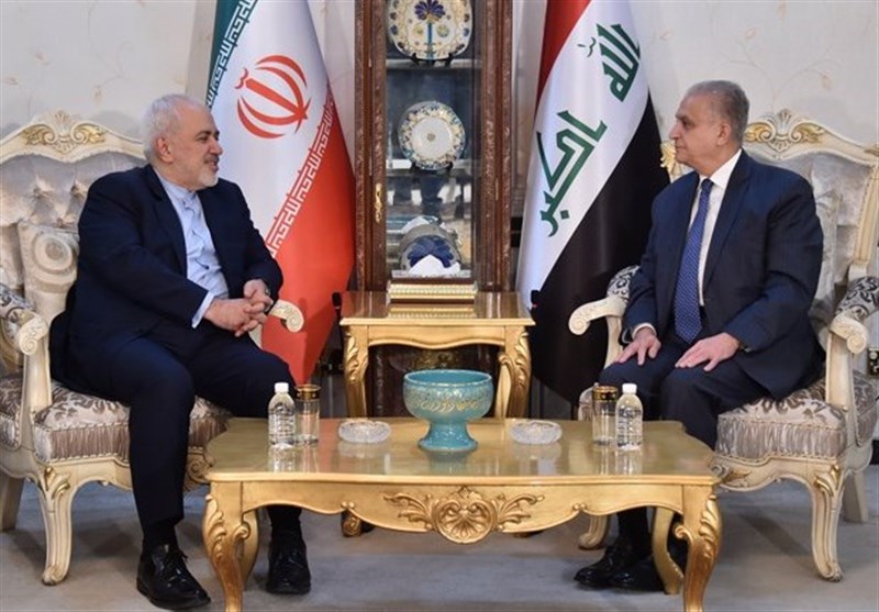 ظریف والحکیم یؤکدان على تعزیز التعاون الاقتصادی والتجاری بین طهران وبغداد
