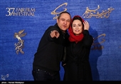 نگار جواهریان بازیگر و همسرش رامبد جوان تهیه‌کننده فیلم طلا در سی‌وهفتمین جشنواره فیلم فجر 