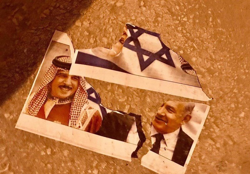 مردم بحرین تصویر پادشاه و نتانیاهو را به آتش کشیدند