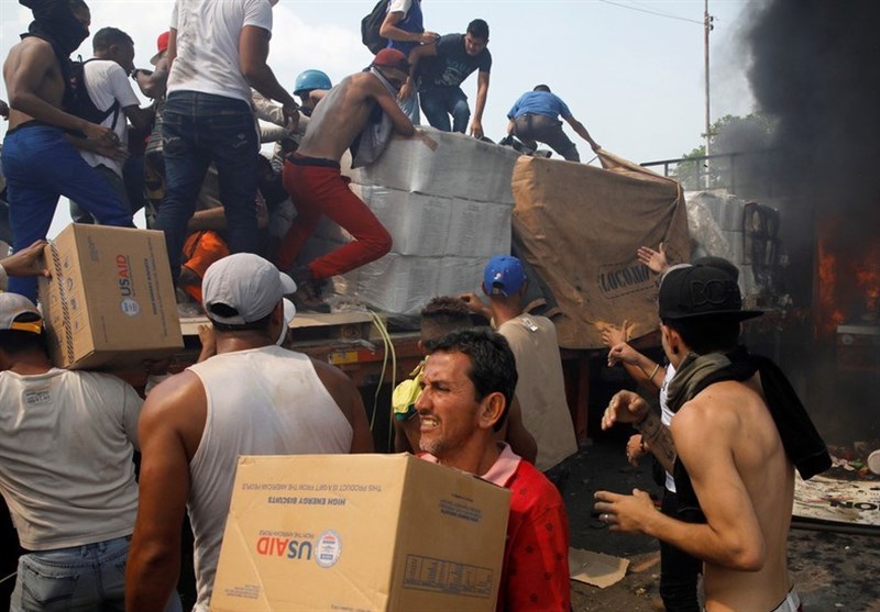 Video Shows Venezuela&apos;s US-Backed Opposition Throwing Molotov Cocktail at Aid Truck