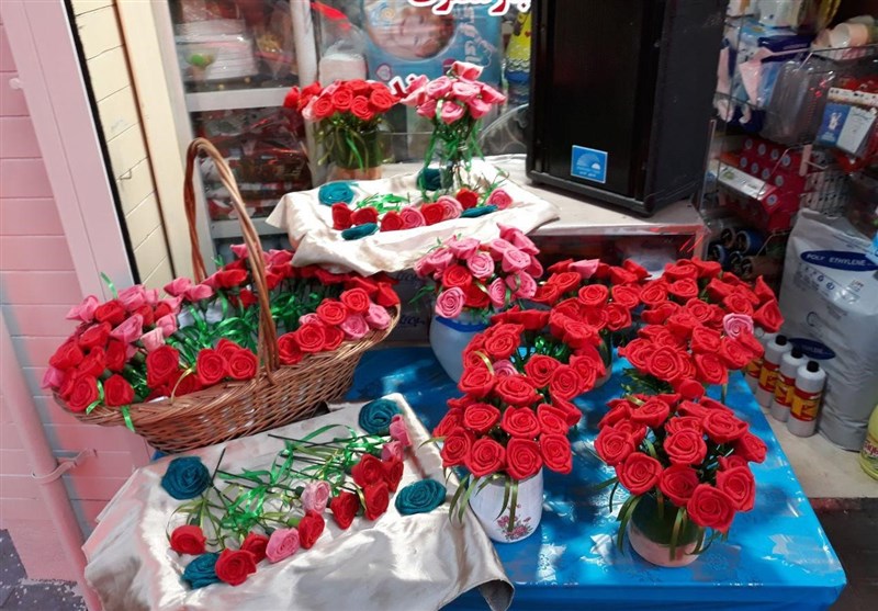 500 شاخه گل اهدایی یک بانوی تهرانی به مادران شهدا +عکس
