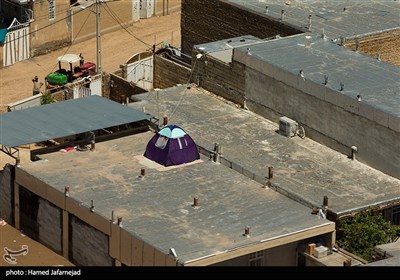 تصویر هوایی از اسکان و چادر زدن مردم سیل زده پلدختر بر پشت بام خانه های خود