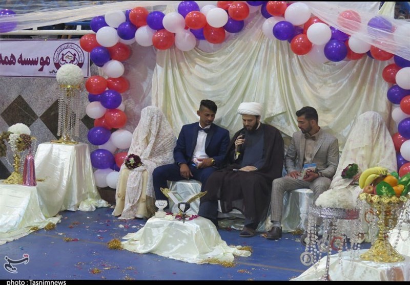 ازدواج دو زوج سیل‌زده کمپ اسکان اضطراری خوزستان+تصویر