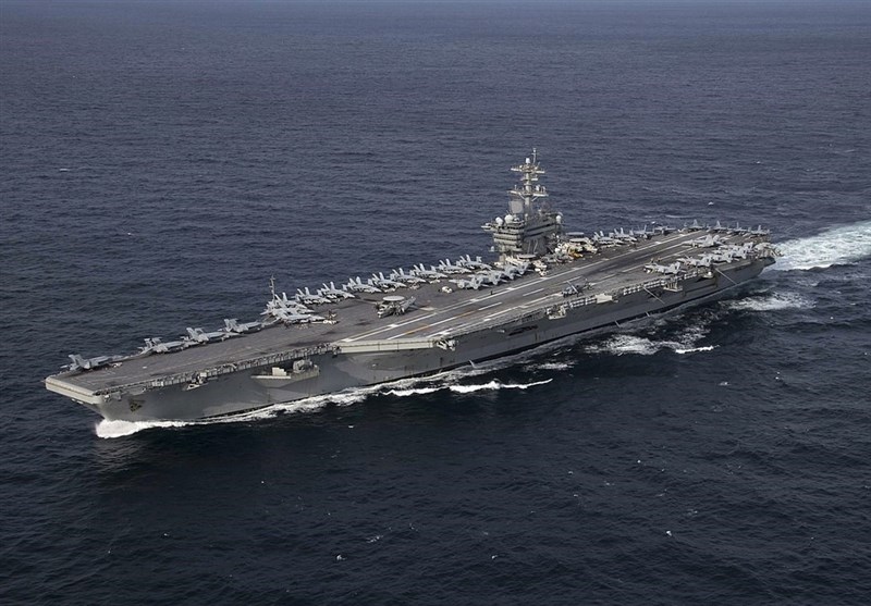 Fire on US Aircraft Carrier Injures 9 Sailors; Cause Sought