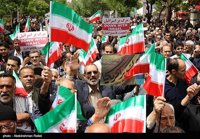 Iranian Protesters Support Tehran&apos;s Move on Halting Certain JCPOA Commitments (+Photos)
