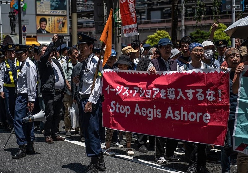 تظاهرات ژاپنی‌ها در اعتراض به ورود ترامپ به توکیو+عکس