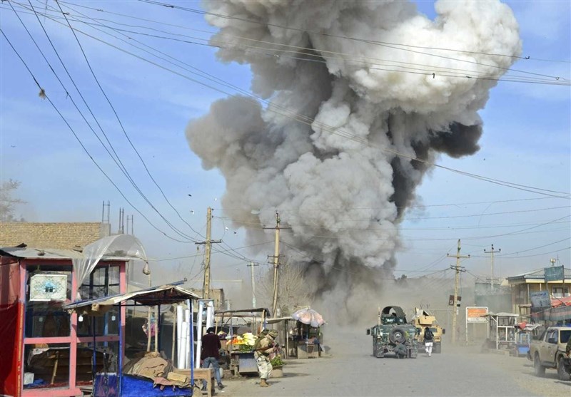 Afghans Search for Bodies after at Least 69 Killed in Mosque Explosions