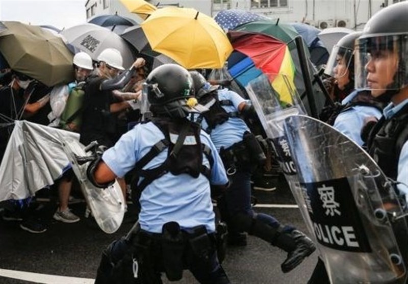 Hong Kong Police Fire Tear Gas at Protesters in Shopping District