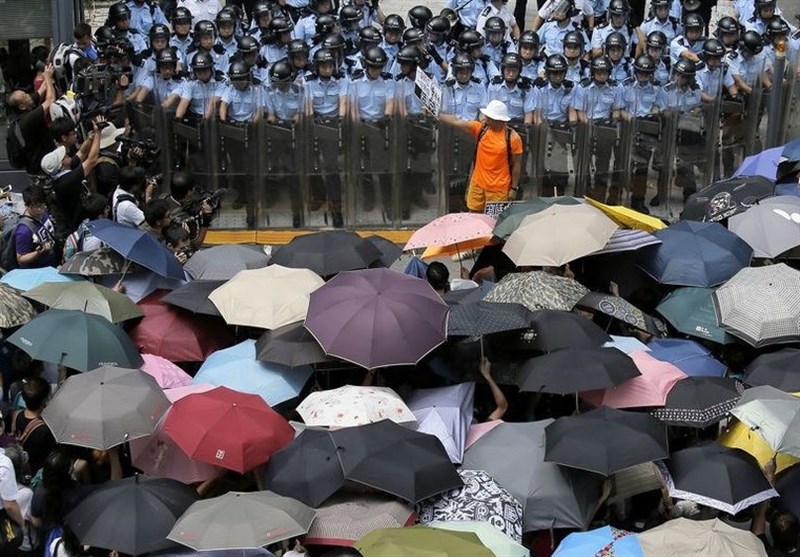 Hong Kong Enters Recession as Protests again Erupt in Flames