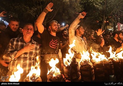 Carrying Torches Part of Muharram Mourning Rites in Tehran