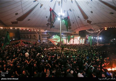 Carrying Torches Part of Muharram Mourning Rites in Tehran