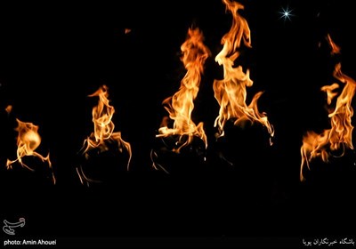 Carrying Torches Part of Muharram Mourning Rites in Tehran