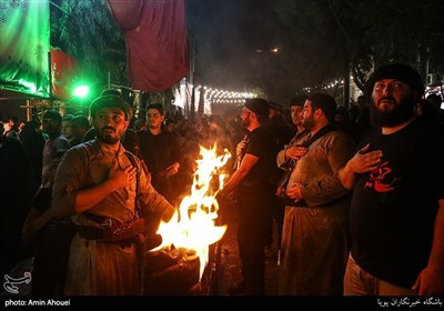 Carrying Torches Part of Muharram Mourning Rites in Tehran