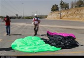 Iranian Military Commandoes Parachute from Milad Tower