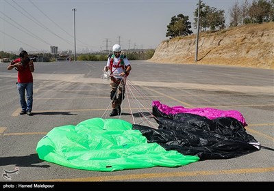 Iranian Military Commandoes Parachute from Milad Tower