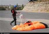Iranian Military Commandoes Parachute from Milad Tower