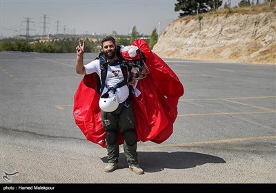 Iranian Military Commandoes Parachute from Milad Tower