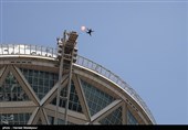 Iranian Military Commandoes Parachute from Milad Tower