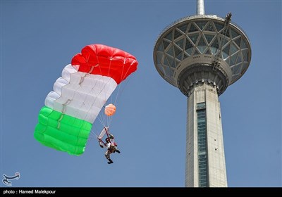 Iranian Military Commandoes Parachute from Milad Tower