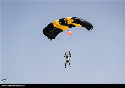 Iranian Military Commandoes Parachute from Milad Tower