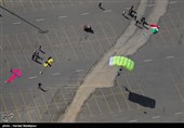 Iranian Military Commandoes Parachute from Milad Tower