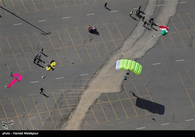 Iranian Military Commandoes Parachute from Milad Tower